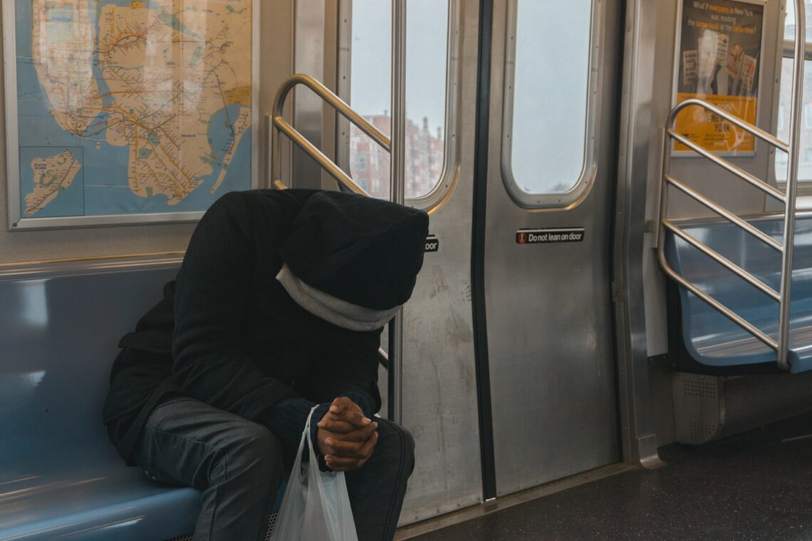 RadioMarocCulture Person In Black Hoodie Sitting On Train Bench 362948